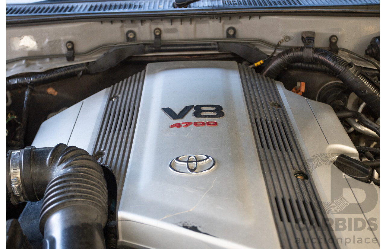 10/2002 Toyota Landcruiser GXL (4x4) FZJ105R 4D Warm Silver Metallic V8 4.7L - 8 Seater