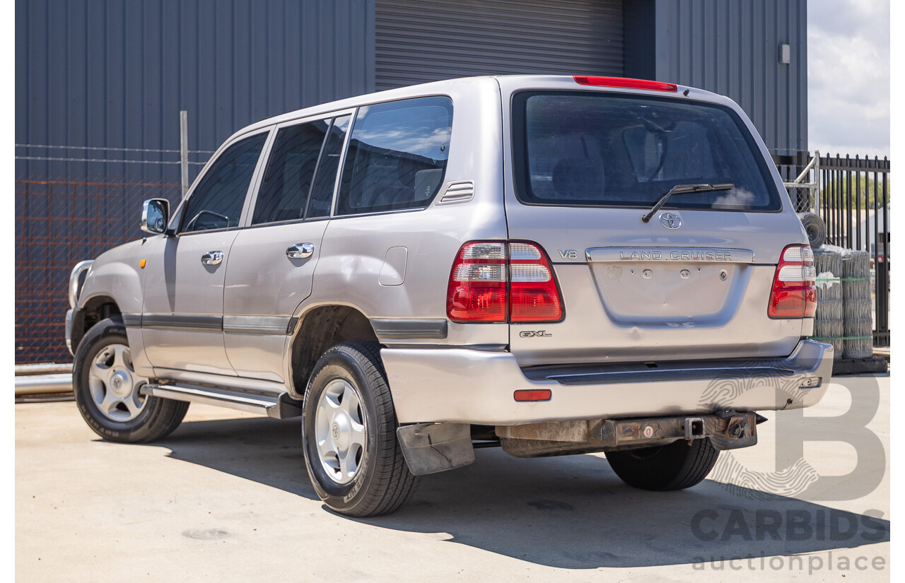 10/2002 Toyota Landcruiser GXL (4x4) FZJ105R 4D Warm Silver Metallic V8 4.7L - 8 Seater