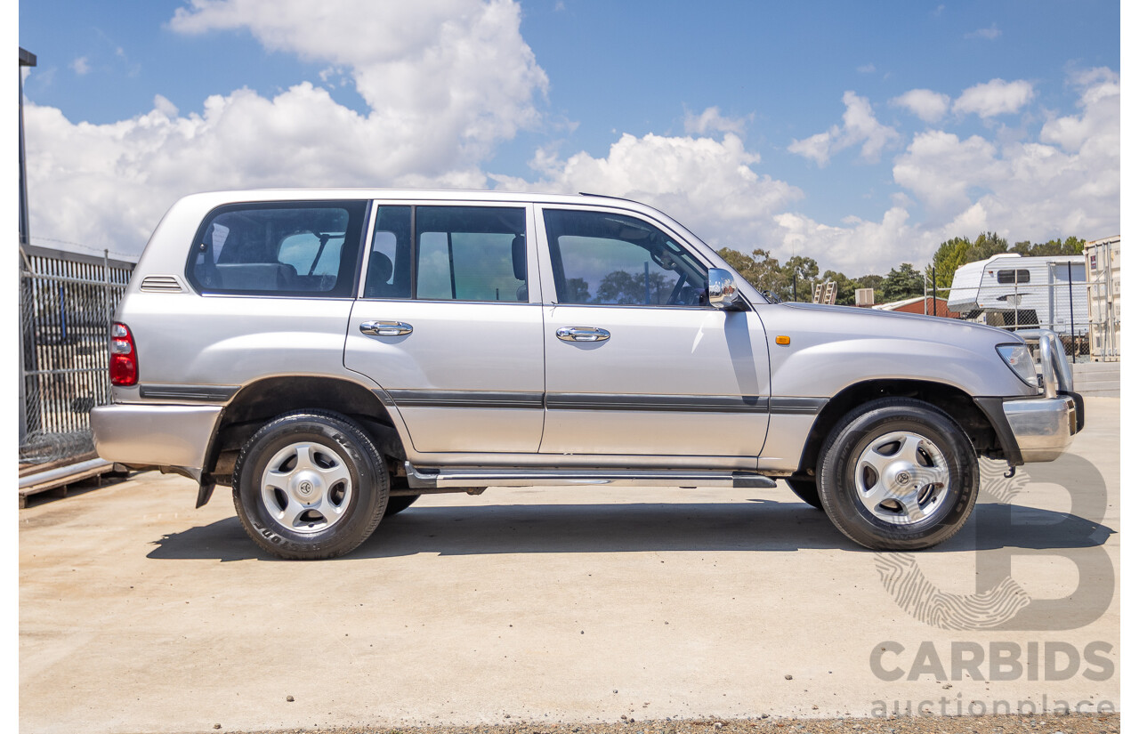 10/2002 Toyota Landcruiser GXL (4x4) FZJ105R 4D Warm Silver Metallic V8 4.7L - 8 Seater