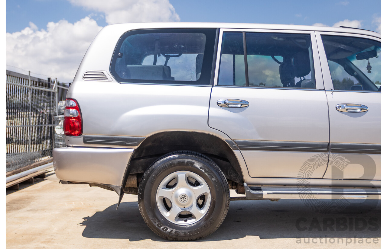 10/2002 Toyota Landcruiser GXL (4x4) FZJ105R 4D Warm Silver Metallic V8 4.7L - 8 Seater