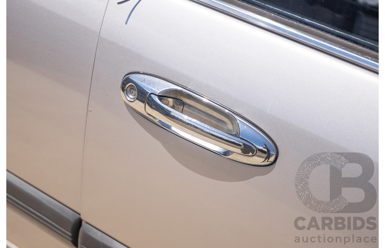 10/2002 Toyota Landcruiser GXL (4x4) FZJ105R 4D Warm Silver Metallic V8 4.7L - 8 Seater