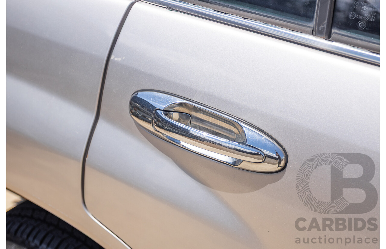 10/2002 Toyota Landcruiser GXL (4x4) FZJ105R 4D Warm Silver Metallic V8 4.7L - 8 Seater