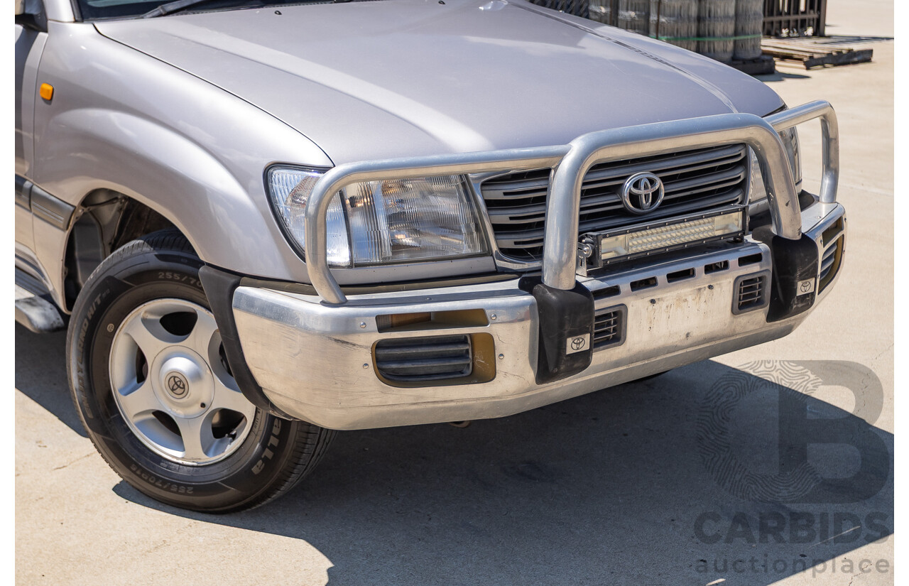 10/2002 Toyota Landcruiser GXL (4x4) FZJ105R 4D Warm Silver Metallic V8 4.7L - 8 Seater