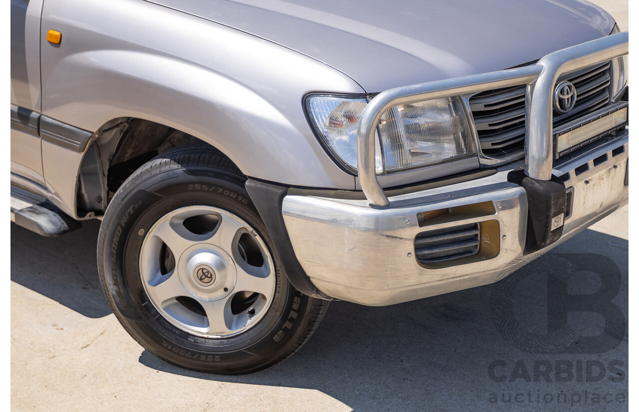 10/2002 Toyota Landcruiser GXL (4x4) FZJ105R 4D Warm Silver Metallic V8 4.7L - 8 Seater