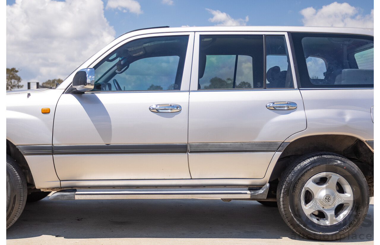 10/2002 Toyota Landcruiser GXL (4x4) FZJ105R 4D Warm Silver Metallic V8 4.7L - 8 Seater