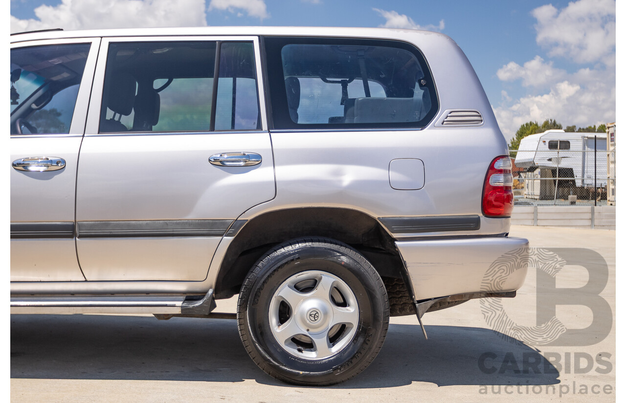 10/2002 Toyota Landcruiser GXL (4x4) FZJ105R 4D Warm Silver Metallic V8 4.7L - 8 Seater