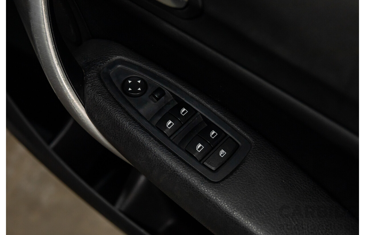 02/2015 BMW 116i Sport (RWD) F20 MY15 5d Hatchback Mineral White Metallic Turbo 1.6L