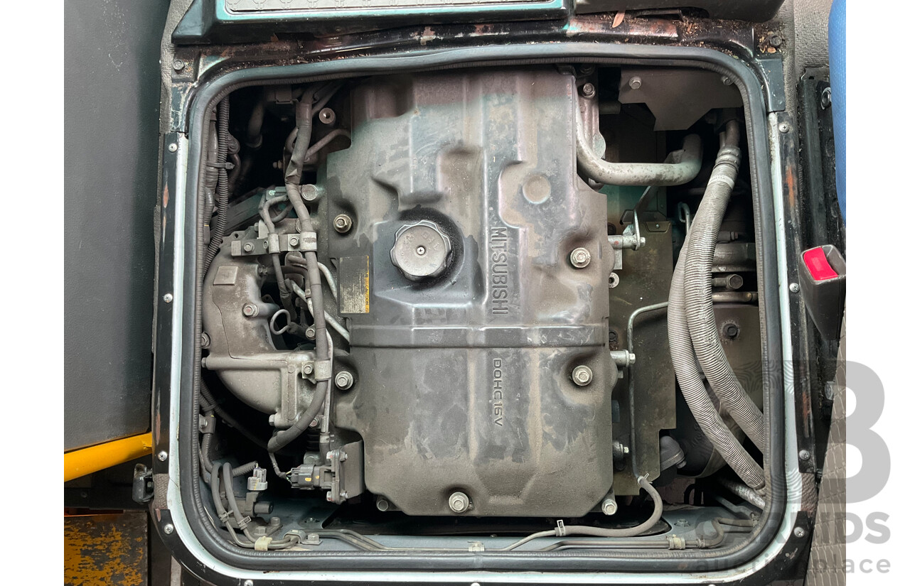 10/2015 Mitsubishi Rosa BE600 18 Seater 3d White Turbo Diesel 4.9L - Custom Wheelchair Lift