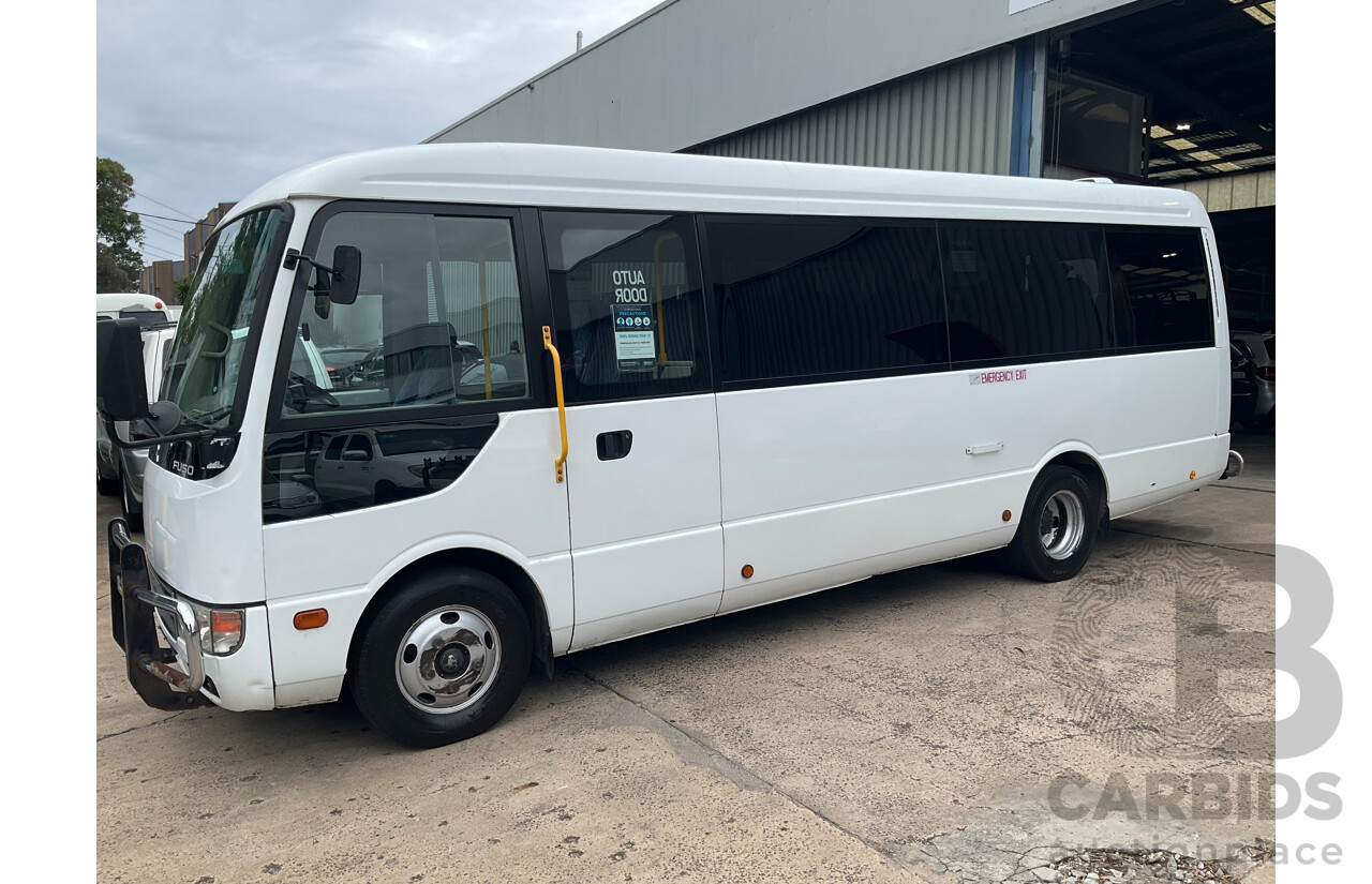 10/2015 Mitsubishi Rosa BE600 18 Seater 3d White Turbo Diesel 4.9L - Custom Wheelchair Lift