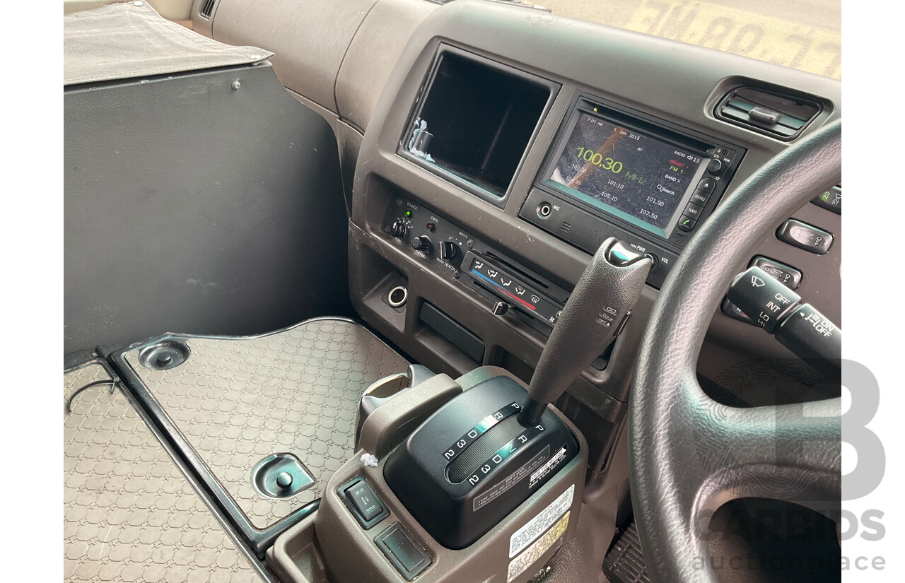 10/2015 Mitsubishi Rosa BE600 18 Seater 3d White Turbo Diesel 4.9L - Custom Wheelchair Lift