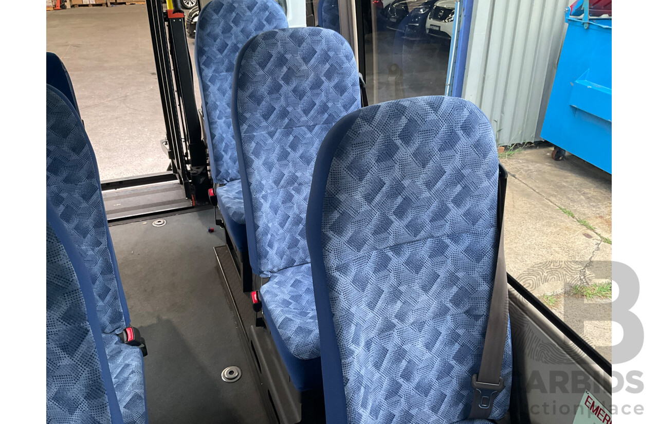 10/2015 Mitsubishi Rosa BE600 18 Seater 3d White Turbo Diesel 4.9L - Custom Wheelchair Lift