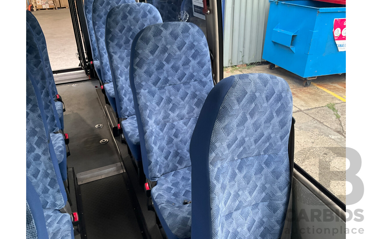 10/2015 Mitsubishi Rosa BE600 18 Seater 3d White Turbo Diesel 4.9L - Custom Wheelchair Lift