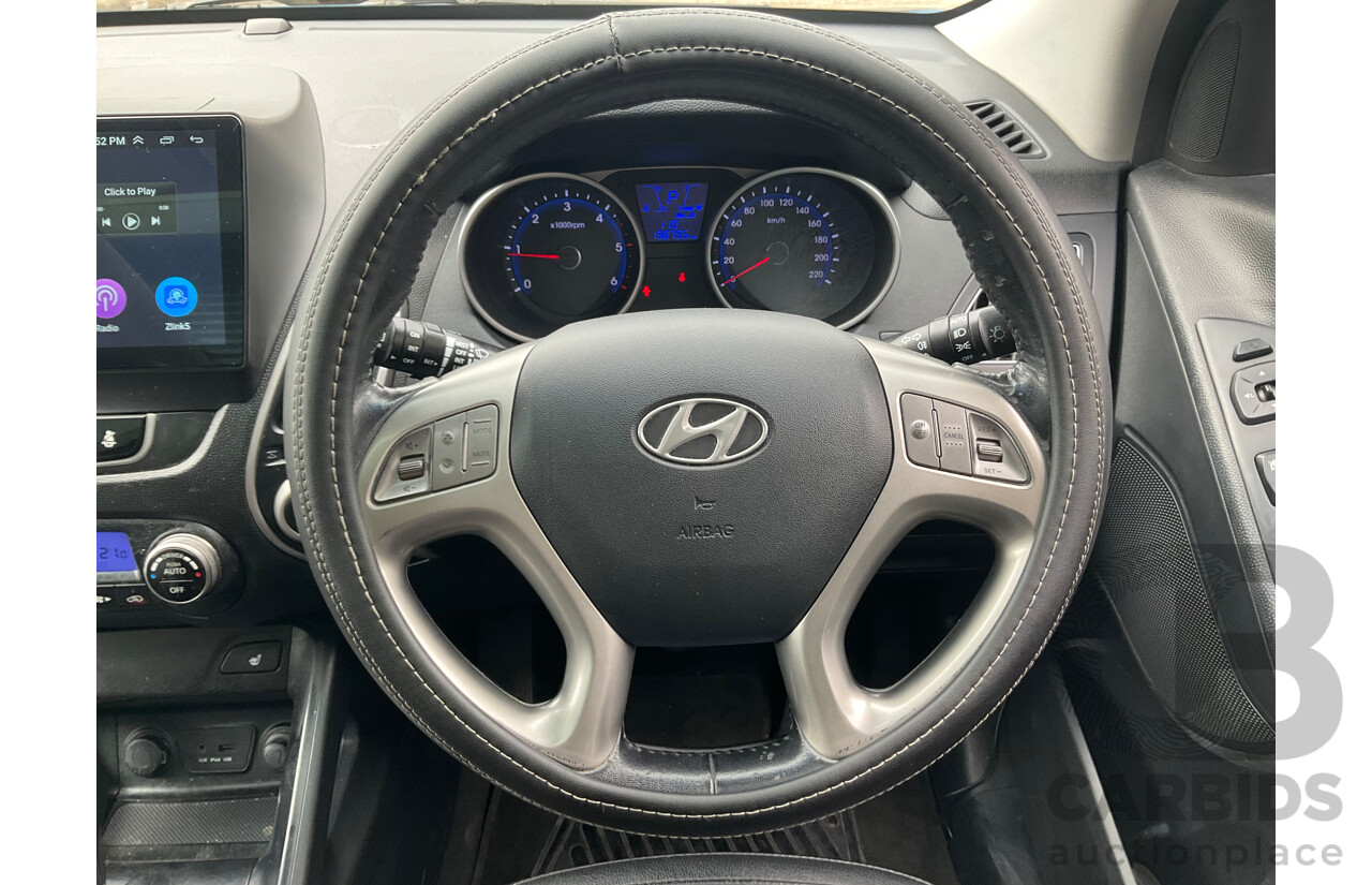 4/2012 Hyundai IX35 Highlander (AWD) LM MY11 4d Wagon Oil Blue Metallic Turbo Diesel 2.0L