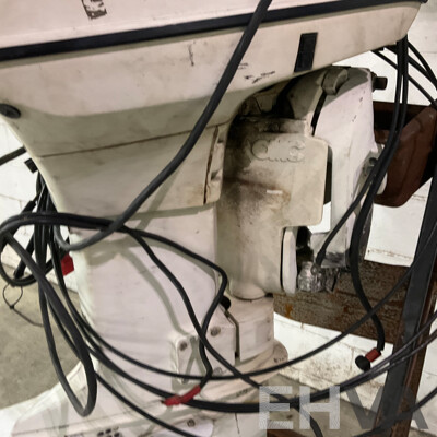 Johnson 70 Outboard Motor with Wheeled Stand