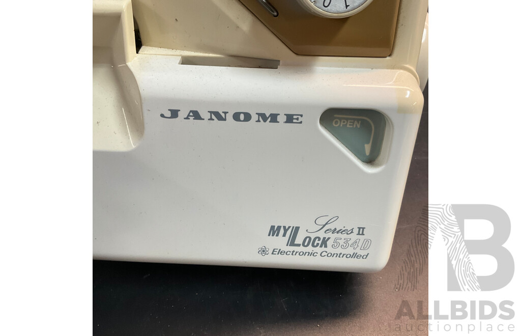 GLOBE 550 & JANOME My Lock 534D Sewing Machines - Lot of 2