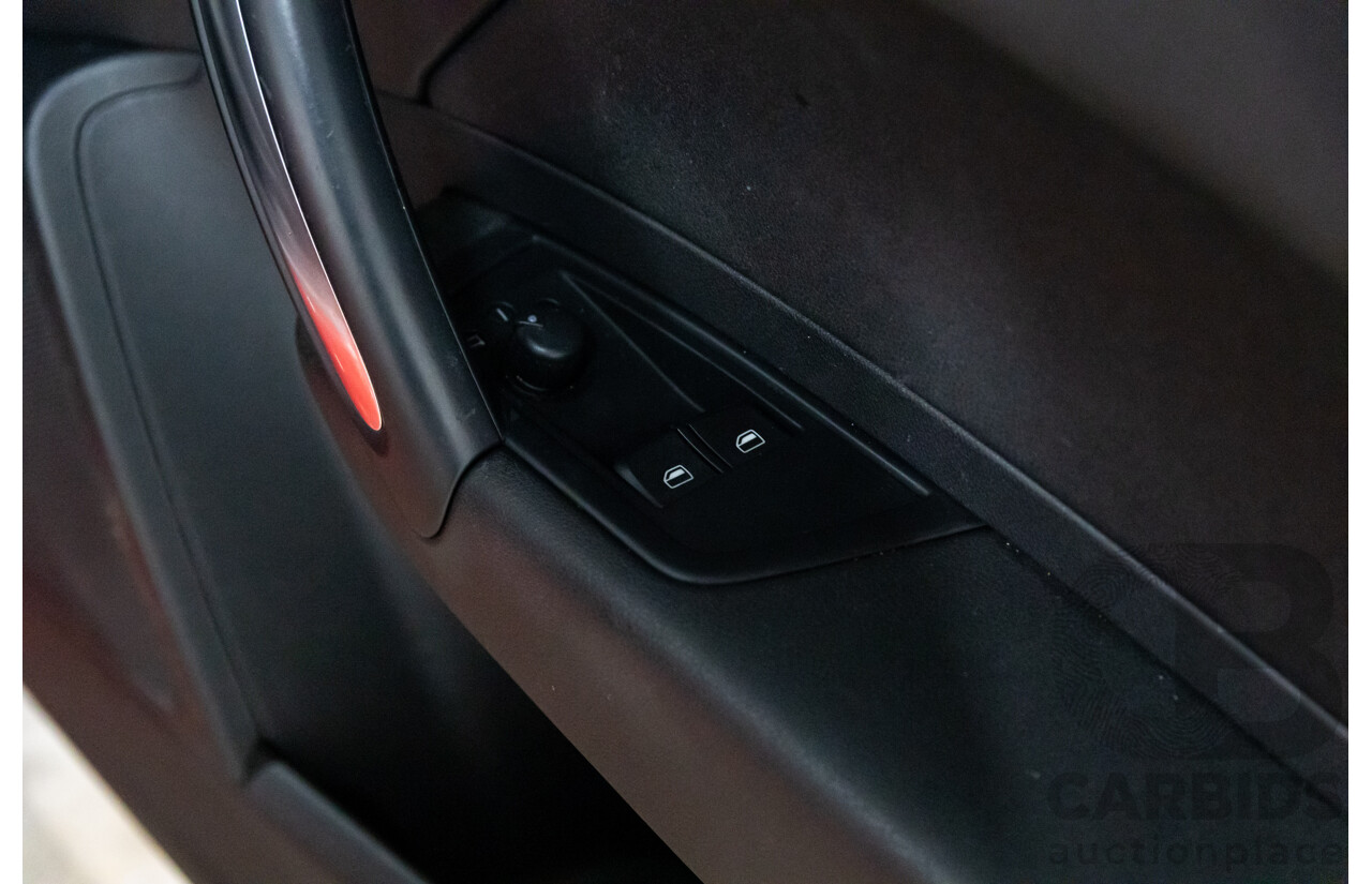 09/2011 Audi A1 1.4 TFSI Ambition (FWD) 8X 3d Hatchback Misano Red Pearl Turbo 1.4L