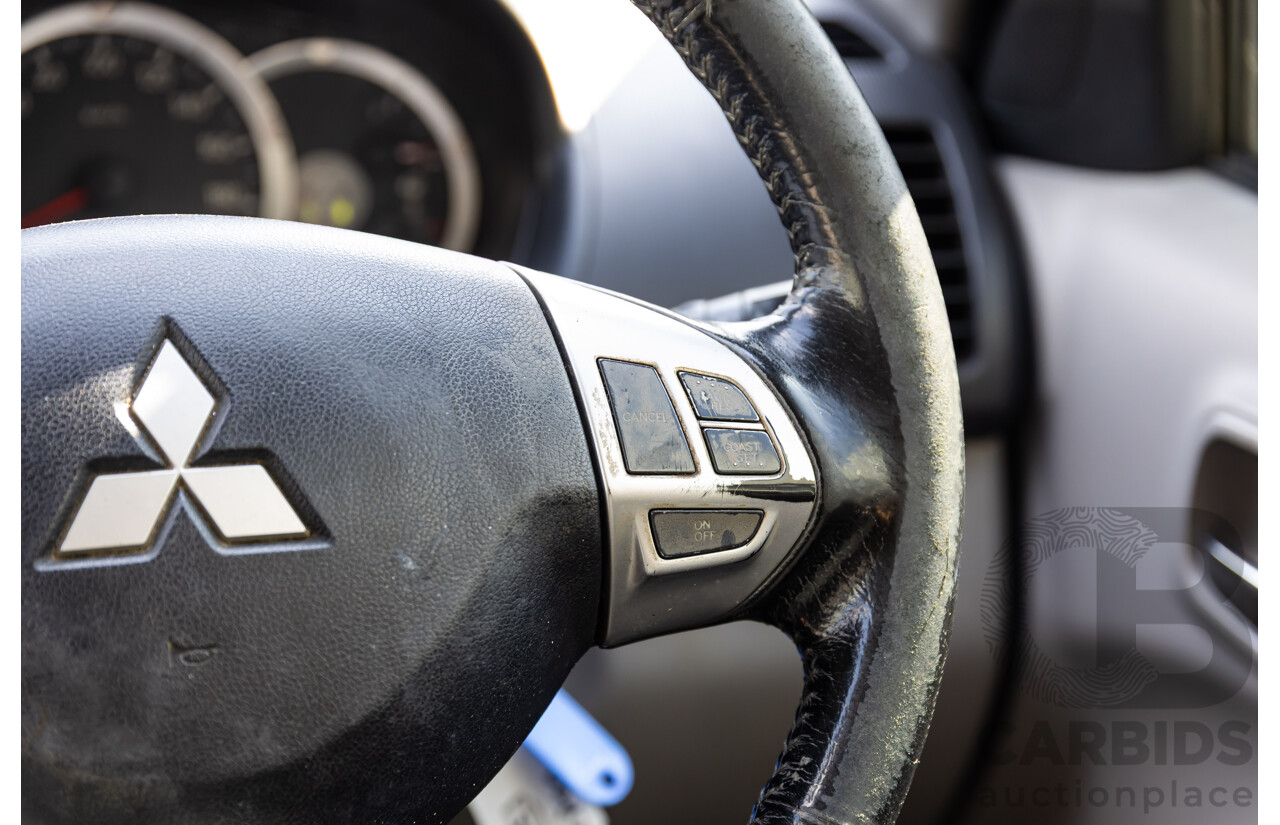 1/2011 Mitsubishi Triton GLX-R (4x4) MN MY11 Double Cab Utility Cool White Turbo Diesel 2.5L