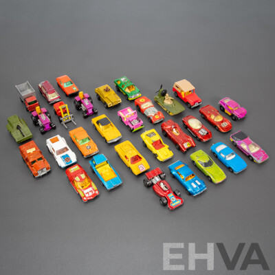 Thirty Vintage Matchbox Vehicles Including Mazda RX 500, Freeman Inter City Commuter, Rod Tractor, Pontiac Firebird, Team Matchbox F1, Peanut Scout Road Dragster and More