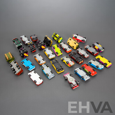 Thirty Vintage Matchbox Vehicles Including Mazda RX 500, Freeman Inter City Commuter, Rod Tractor, Pontiac Firebird, Team Matchbox F1, Peanut Scout Road Dragster and More