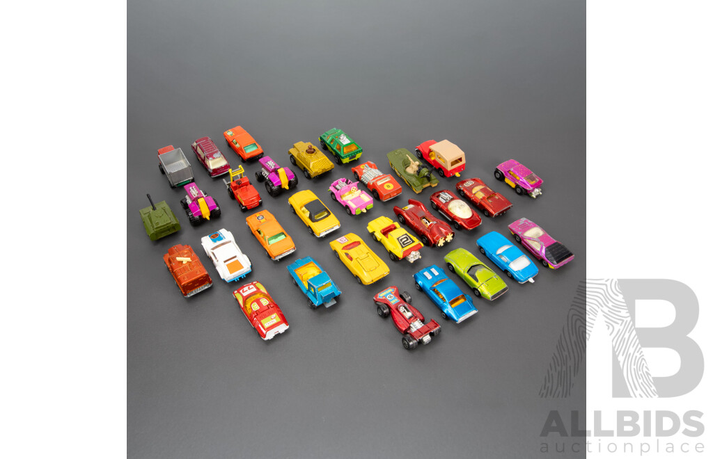 Thirty Vintage Matchbox Vehicles Including Mazda RX 500, Freeman Inter City Commuter, Rod Tractor, Pontiac Firebird, Team Matchbox F1, Peanut Scout Road Dragster and More