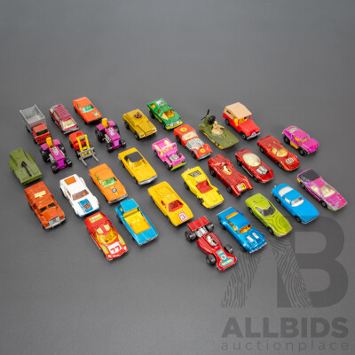 Thirty Vintage Matchbox Vehicles Including Mazda RX 500, Freeman Inter City Commuter, Rod Tractor, Pontiac Firebird, Team Matchbox F1, Peanut Scout Road Dragster and More