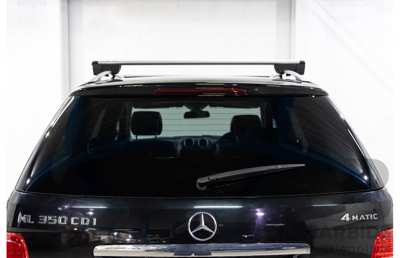 4/2011 Mercedes-Benz ML 350 CDI (4x4) 164 MY11 4d Wagon Black Obsidian Metallic Turbo Diesel V6 3.0L