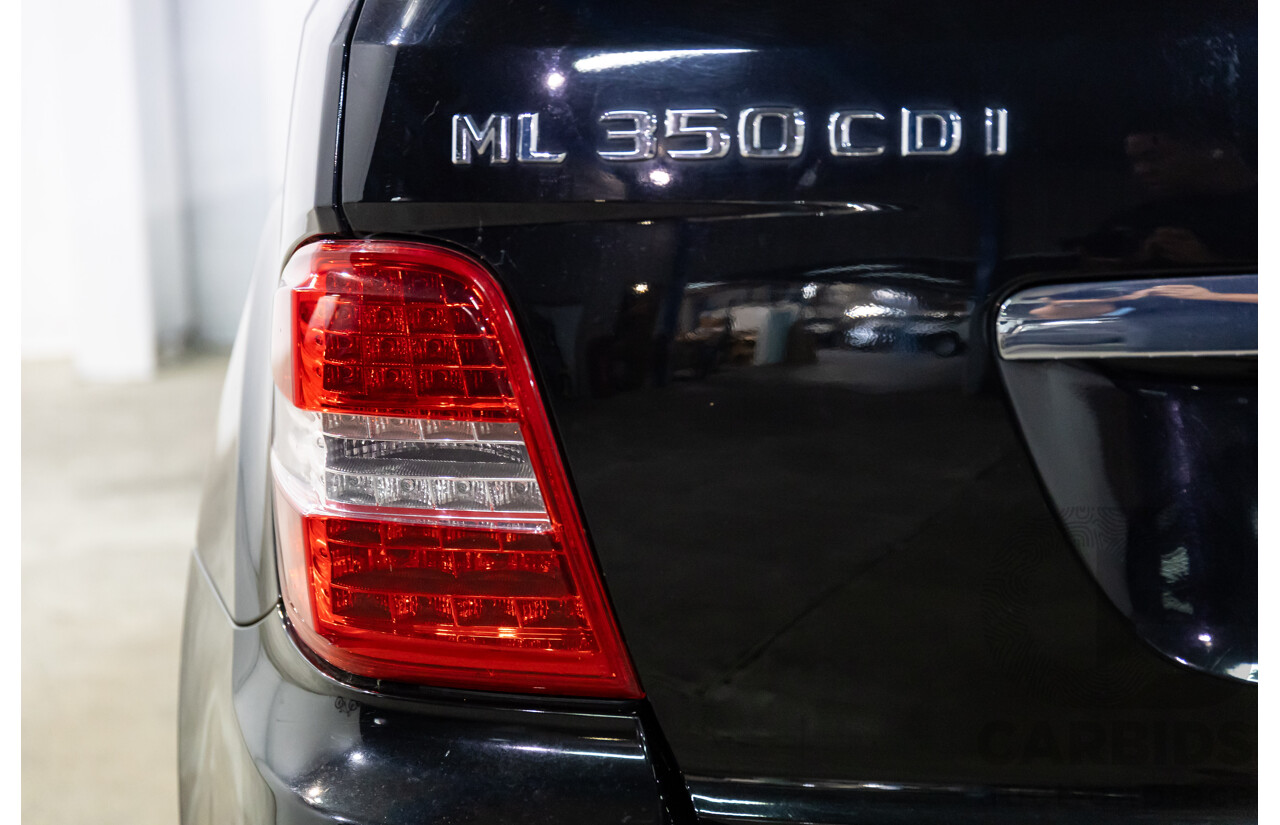 4/2011 Mercedes-Benz ML 350 CDI (4x4) 164 MY11 4d Wagon Black Obsidian Metallic Turbo Diesel V6 3.0L