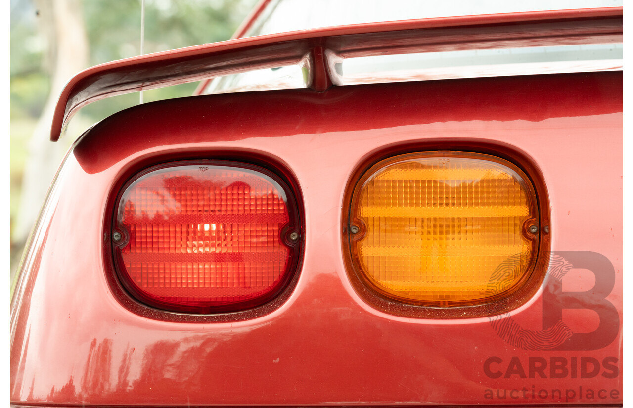 01/1985 Chevrolet Corvette C4 2d Coupe Two Tone Red / Beige V8 5.7L