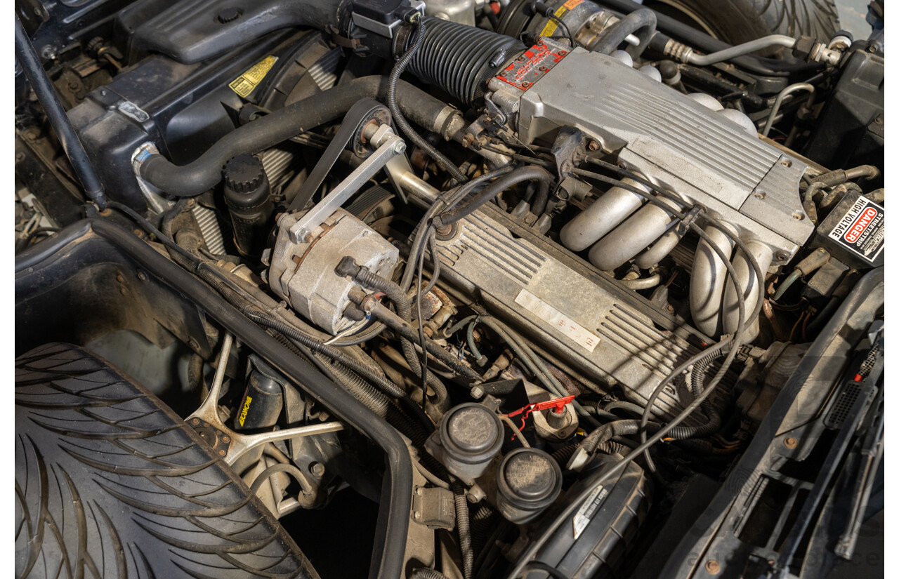 01/1985 Chevrolet Corvette C4 2d Coupe Two Tone Red / Beige V8 5.7L