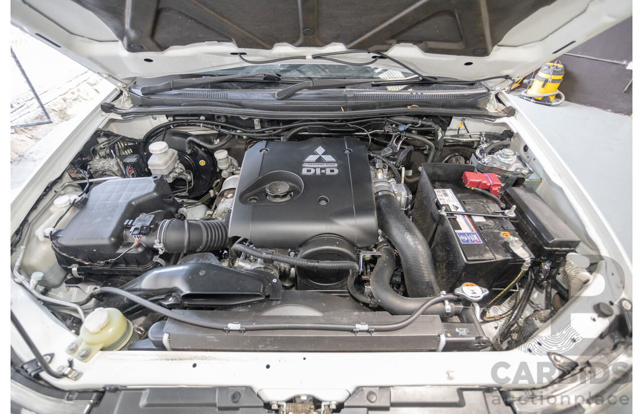 06/2015 Mitsubishi Triton GLX+ (4x4) MN MY15 Double Cab Utility White Turbo Diesel 2.5L