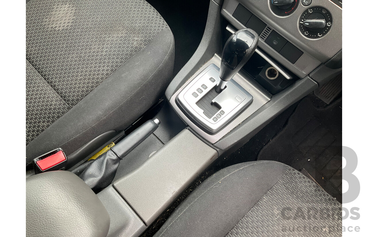 3/2007 Ford Focus Zetec LS 5d Hatchback Pure Silver Metallic  2.0L