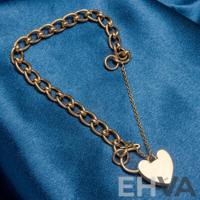 9ct Yellow Gold Curb Link Bracelet with Heart Locket - 22.77gms