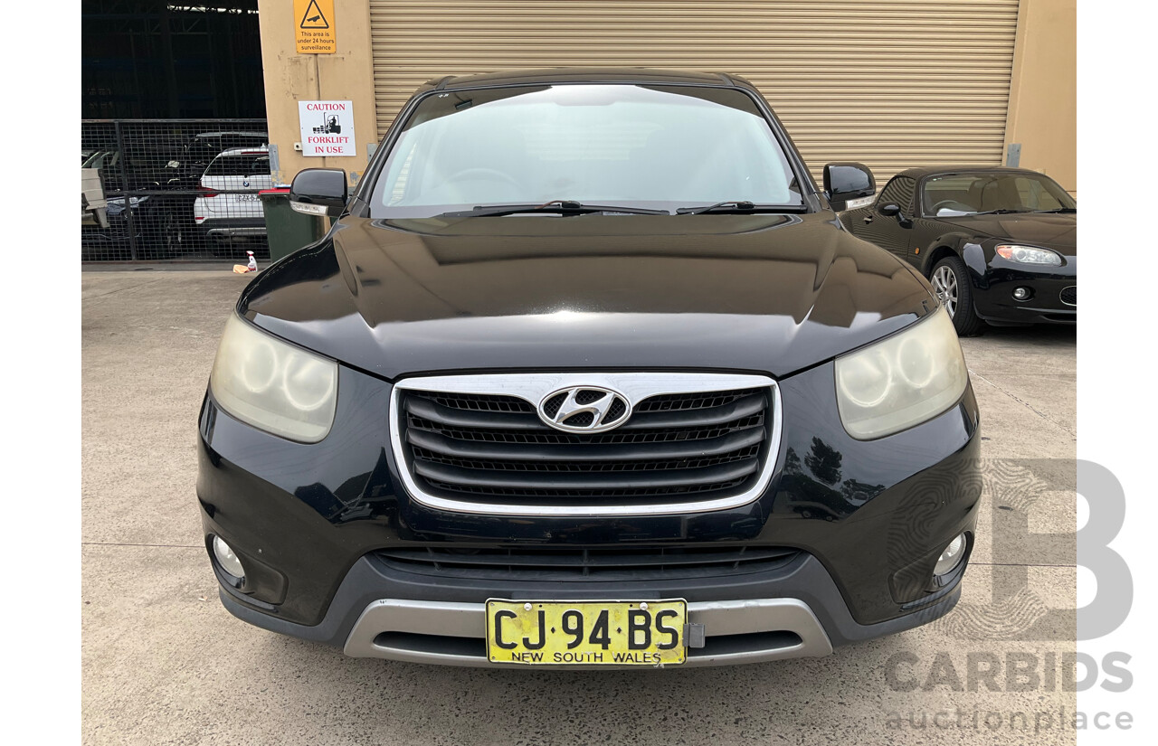 4/2012 Hyundai Santa Fe Trail CRDi (4x4) CM MY12 4d Wagon Phantom Black Pearl Turbo Diesel 2.2L - 7 Seater