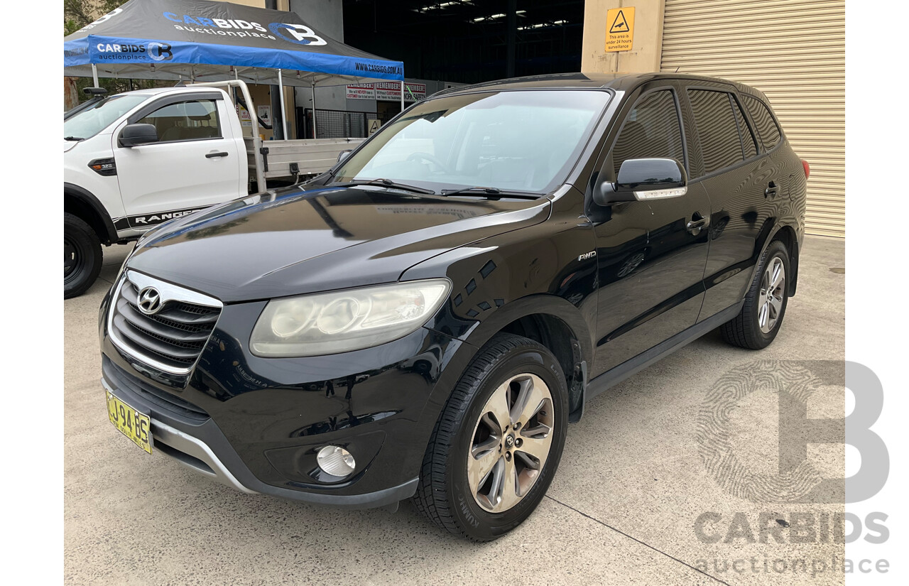 4/2012 Hyundai Santa Fe Trail CRDi (4x4) CM MY12 4d Wagon Phantom Black Pearl Turbo Diesel 2.2L - 7 Seater