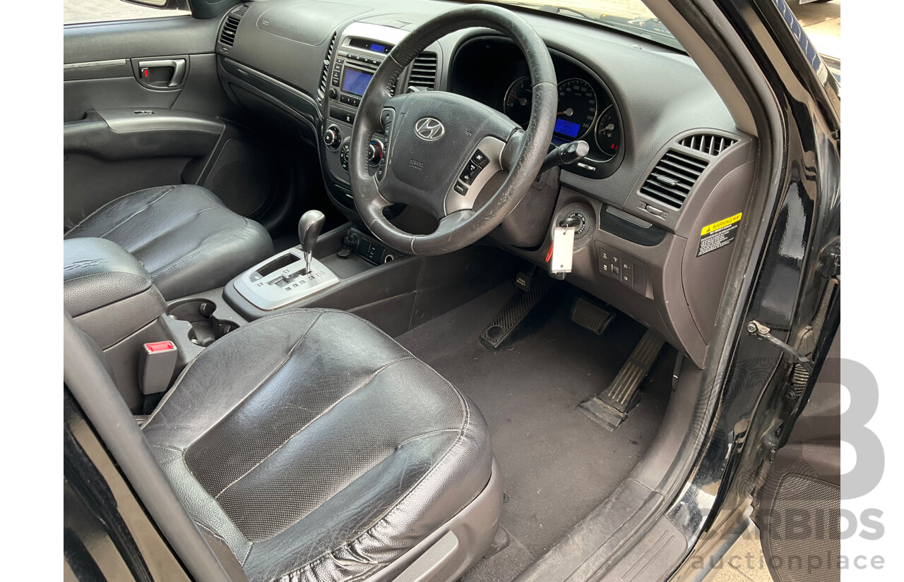 4/2012 Hyundai Santa Fe Trail CRDi (4x4) CM MY12 4d Wagon Phantom Black Pearl Turbo Diesel 2.2L - 7 Seater