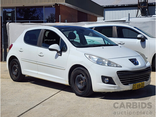 6/2010 Peugeot 207 XT HDi MY10 5d Hatchback White 1.6L