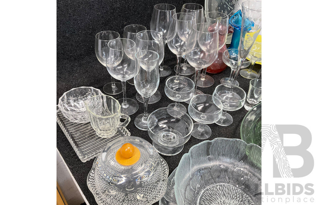 Assorted Glassware - Plates, Various Wine Glasses, Bowls, and More