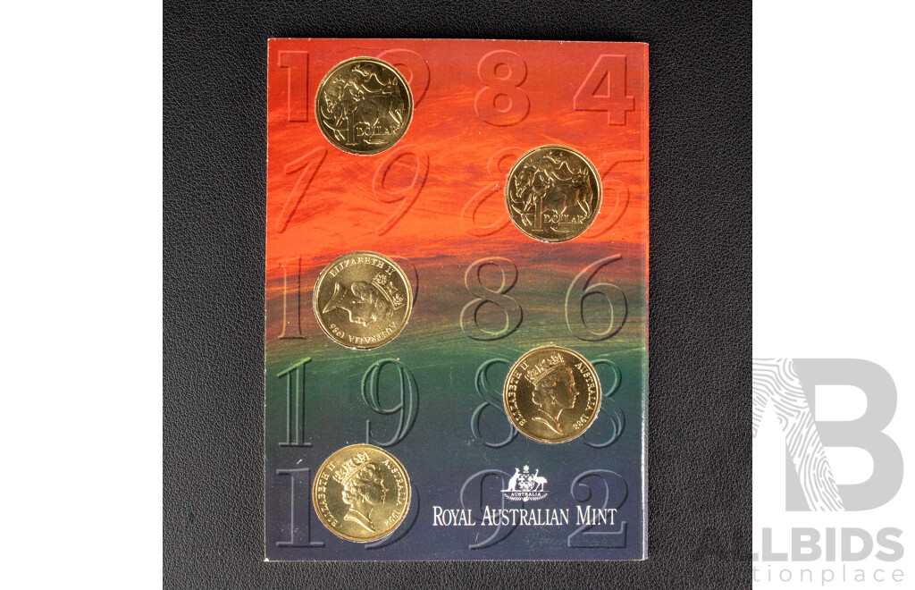 Two Australian One Dollar UNC Coin Sets Including 1984 First Year Issue, 1985, 1986 Year of Peace, 1988 Aboriginal Kangaroo, 1992 Barcelona Olympics