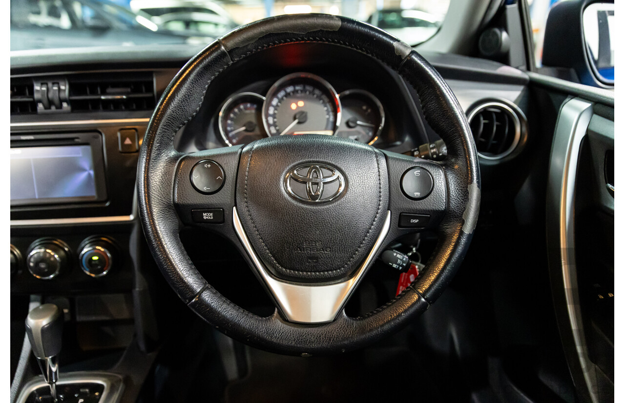 01/2015 Toyota Corolla ASCENT SPORT FWD ZRE182R 5D Hatchback Blue Streak Metallic 1.8L