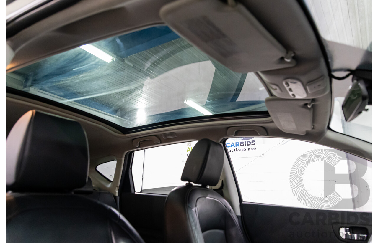 2/2013 Nissan Dualis Ti-L (4x2) J10 MY13 4d Wagon Ivory Pearl 2.0L