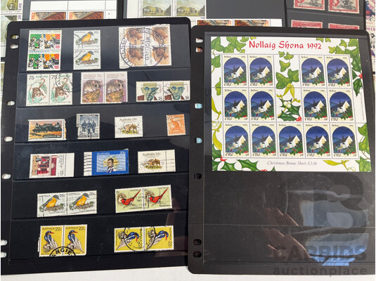 Collection of Vintage International Mint and Cancelled Stamps Including British Solomon Islands, Norway, Netherlands, Nigeria, Australia, Ireland, Gilbert & Ellice Islands, Samoa, Dominica, Uganda, Tanganyika, Bahamas, Seychelles