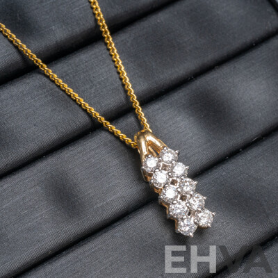 18ct Yellow Gold Diamond Pendant with Gold Tone Necklace - 1.89gms