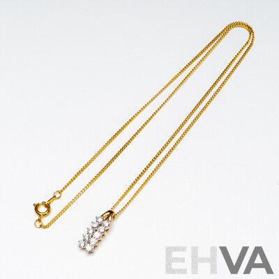 18ct Yellow Gold Diamond Pendant with Gold Tone Necklace - 1.89gms