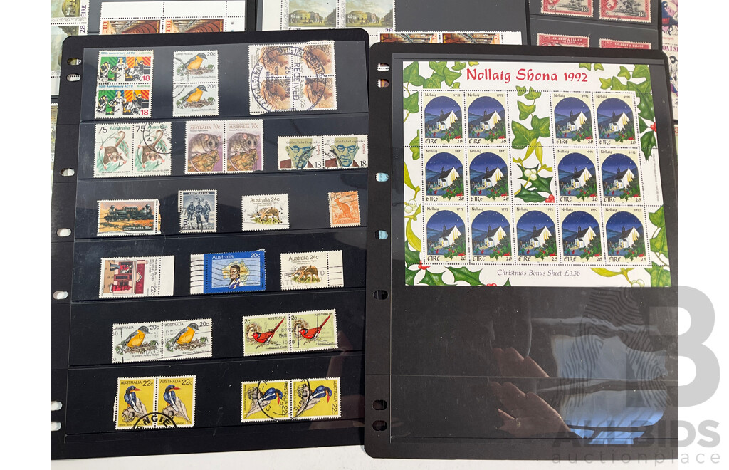 Collection of Vintage International Mint and Cancelled Stamps Including British Solomon Islands, Norway, Netherlands, Nigeria, Australia, Ireland, Gilbert & Ellice Islands, Samoa, Dominica, Uganda, Tanganyika, Bahamas, Seychelles