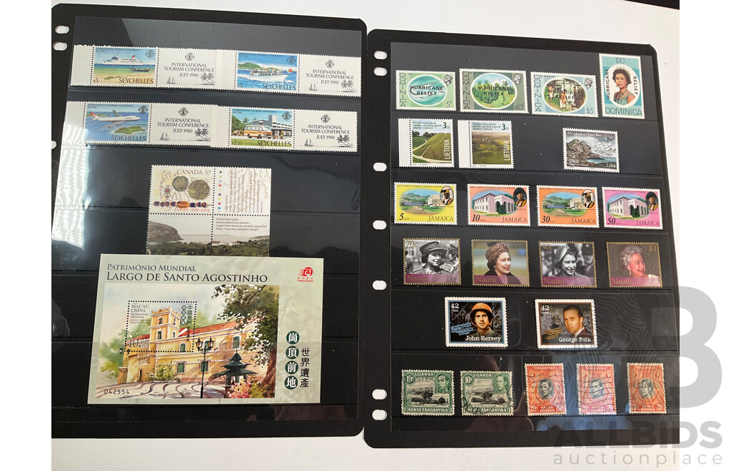 Collection of Vintage International Mint and Cancelled Stamps Including British Solomon Islands, Norway, Netherlands, Nigeria, Australia, Ireland, Gilbert & Ellice Islands, Samoa, Dominica, Uganda, Tanganyika, Bahamas, Seychelles