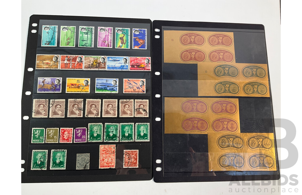Collection of Vintage International Mint and Cancelled Stamps Including British Solomon Islands, Norway, Netherlands, Nigeria, Australia, Ireland, Gilbert & Ellice Islands, Samoa, Dominica, Uganda, Tanganyika, Bahamas, Seychelles