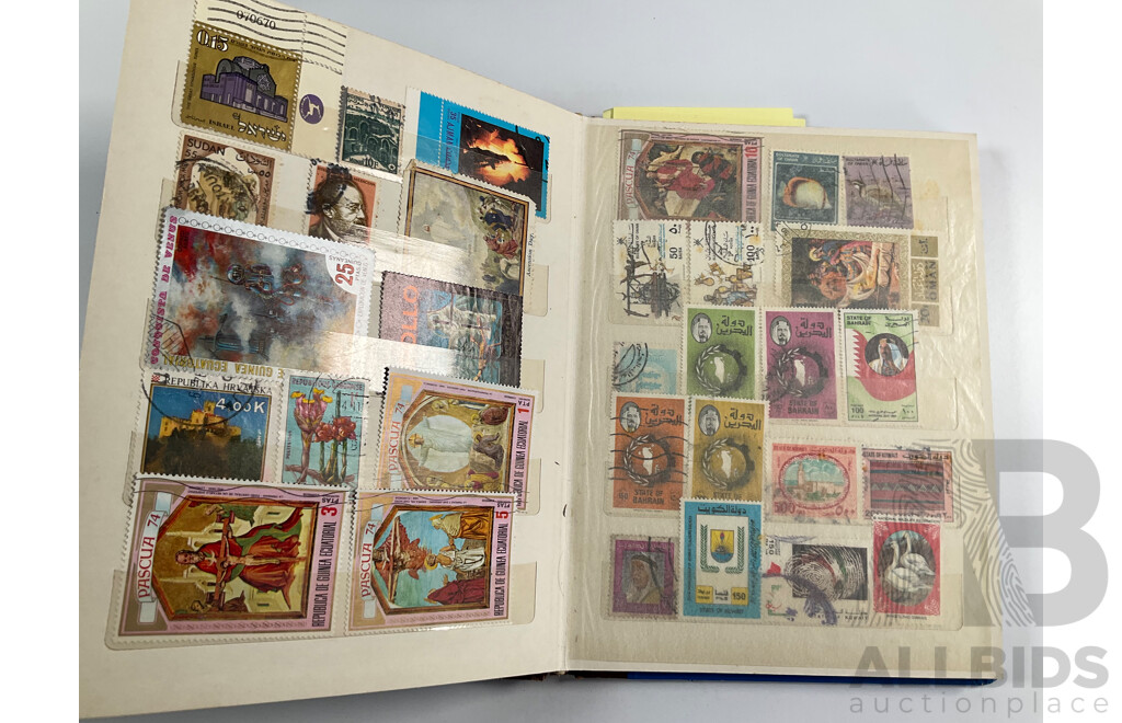 Four Albums of International Vintage Stamps Including Spain, Canada, Mauritius, Philippines, Monaco, Hong Kong, Netherlands, Zambia, Tonga and More