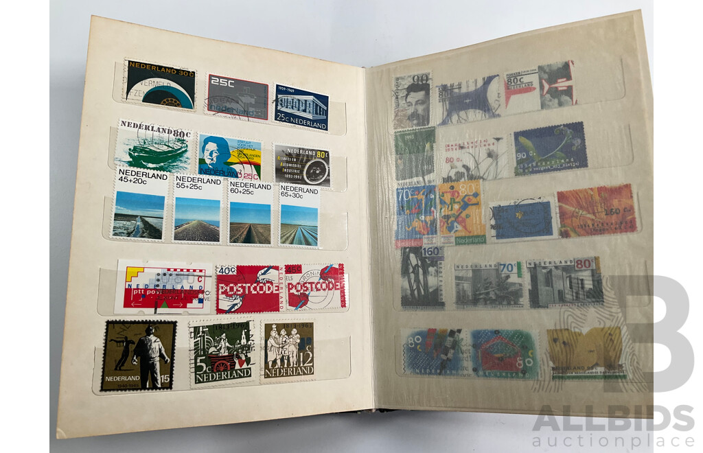 Four Albums of International Vintage Stamps Including Spain, Canada, Mauritius, Philippines, Monaco, Hong Kong, Netherlands, Zambia, Tonga and More
