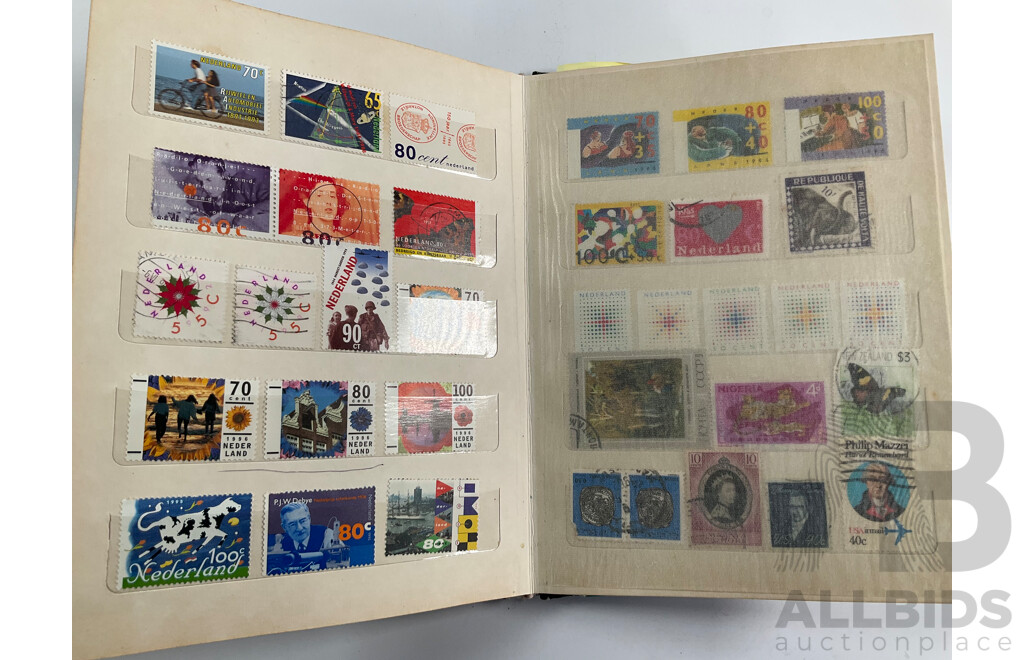 Four Albums of International Vintage Stamps Including Spain, Canada, Mauritius, Philippines, Monaco, Hong Kong, Netherlands, Zambia, Tonga and More