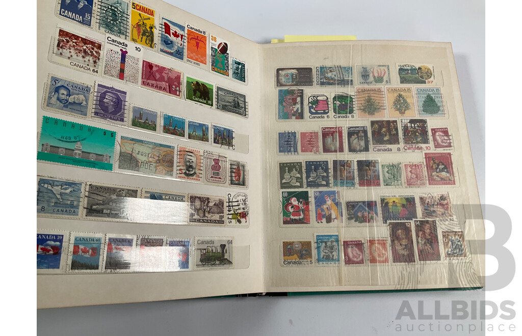 Four Albums of International Vintage Stamps Including Spain, Canada, Mauritius, Philippines, Monaco, Hong Kong, Netherlands, Zambia, Tonga and More